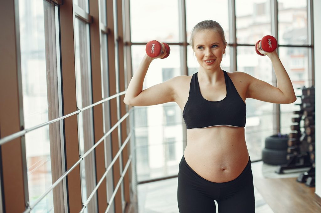 Woman working out during pregnancy
