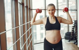 Woman working out during pregnancy