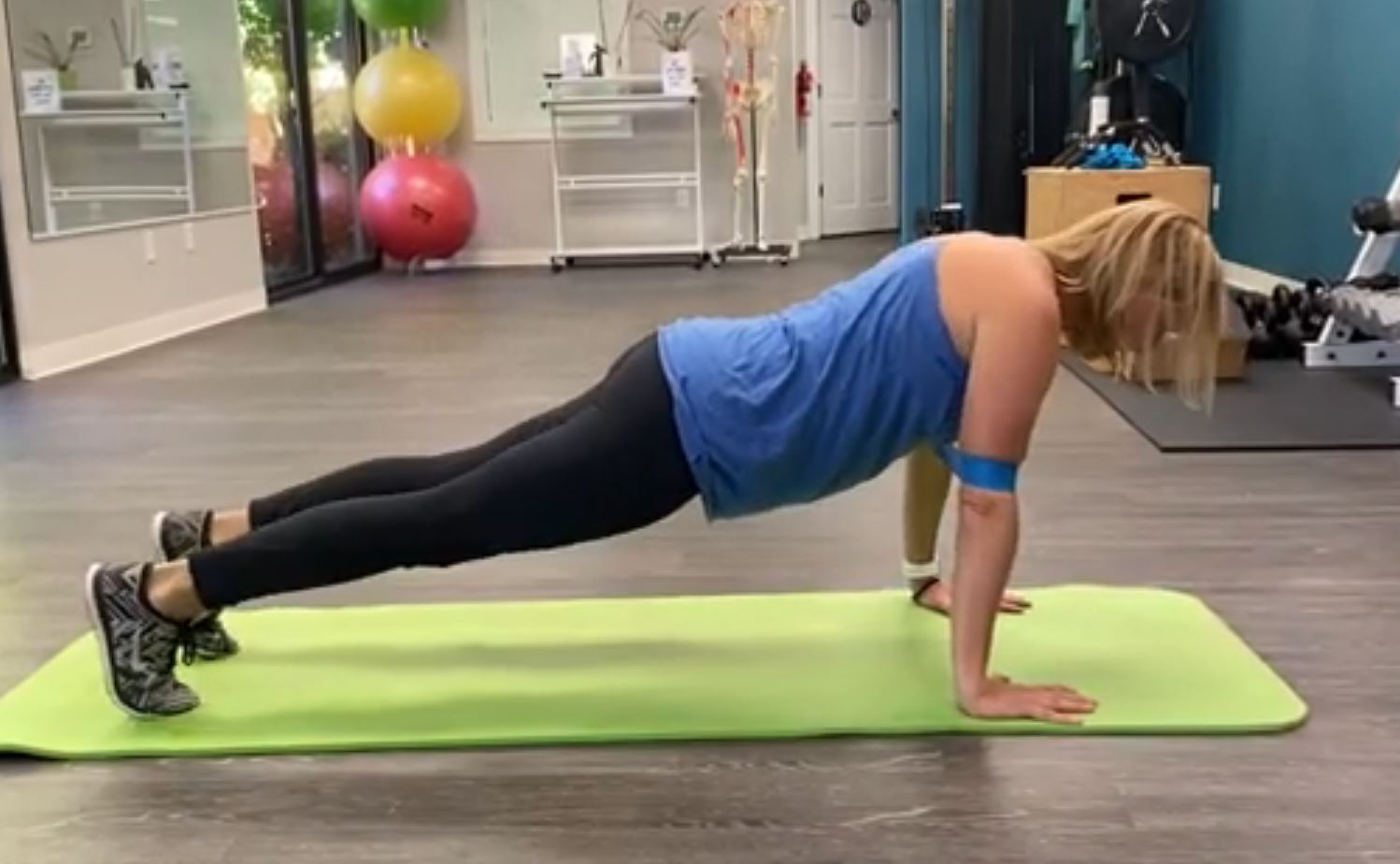 Reno Physical Therapist, Dr. Danielle Littoff, DPT demonstrates proper form for a push up