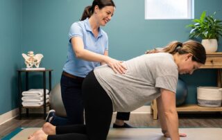 Patient working with a physical therapist at a performance physical therapy clinic in Reno